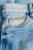 next-chlopiece-jasne-jeansowe-spodnie-jeansy-zblizenie2.webp