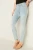 old-navy-jasne-jeansy-super-skinny-sredni-stan-modelka-przod.webp