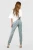 Boohoo-spodnie-jeansy-mum-dziury-wysoki-stan-modelka-tyl.webp