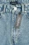 Boohoo-spodnie-jeansy-mum-dziury-wysoki-stan-zblizenie.webp