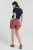 Mountain-Warehouse-damskie-spodenki-uv-modelka-tyl.webp