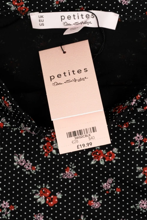 Miss-Selfridge-czarna-spodniczka-w-kolorowe-kwiaty-zblizenie2.webp