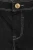 Bershka-czarne-biale-szwy-spodnie-super-skinny-zblizenie.webp