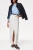 M&amp;S-jasnoniebieski-sweter-kardigan-brazowy-guzik-modelka-przod2.webp