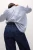 M&S-granatowe-jeansy-spodnie-wilde-szerokie-nogawki-modelka-tyl.webp