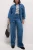 M&S-ciemne-jeansowe-spodnie-szeroka-nogawka-jeans-modelka-przod.webp