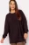 Yours-burgundowy-asymetryczny-sweter-plus-size-modelka-przod.webp