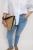 M&S-Lily-Slim-jasne-jeansowe-spodnie-skinny-jeansy-modelka-zblizenie.webp