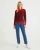 M&S-czerwony-bordowy-sweter-w-pasy-guziki-modelka.webp