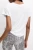 M&S-biala-lniana-bluzka-t-shirt-modal-modelka-tyl.webp