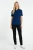 tu-granatowa-bluzka-z-modalu-w-grochy-plus-size-modelka-przod.webp