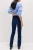 M&S-spodnie-granatowe-jeansy-the-sienna-straight-jeansowe-proste-modelka-tyl.webp