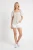 Wallis-blekitna-kobieca-lekka-bluzka-w-kwiaty-modelka.webp
