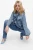 Only-damska-jasna-jeansowa-kurtka-katana-modelka-przod2.webp