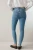 Next-jasne-jeansowe-melanzowe-damskie-jeansy-modelka-tyl.webp