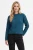 H&M-szmaragdowy-pudelkowy-sweter-modelka.webp