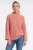 Topshop-brzoskwiniowy-sweter-polgolf-modelka.webp