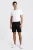 Boohoo-meskie-czarne-spodenki-typu-chino-model-przod.webp