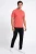 Dunnes-koralowa-meska-bluzka-polo-t-shirt-model.webp