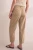 Next-lniane-camel-spodnie-len-modelka-tyl.webp