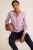 M&S-liliowy-pudrowy-roz-sweter-kardigan-brazowy-guzik-modelka-przod2.webp