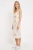 Atmosphere-kremowa-sukienka-w-kwiaty-pasek-modelka-bok.webp
