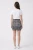 Ann-Summers-mini-spodniczka-modelka-tyl.webp