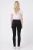 H&M-czarne-spodnie-jeansy-modelka-tyl.webp
