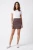 Lustre-bordowa-spodniczka-mini-modelka-przod.webp