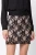 C&A-rozowa-spodniczka-mini-z-czarna-koronka-modelka-glowne.webp