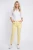 George-cytrynowe-spodnie-jeansy-zamki-modelka-przod.webp