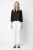 M&S-biale-spodnie-jeansy-hafty-modelka-przod.webp