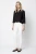 M&S-biale-spodnie-jeansy-hafty-modelka-przod2.webp