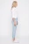 C&A-blekitne-spodnie-jeansy-crop-zamki-modelka-przod2.webp