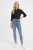 C&A-jeansowe-melanzowe-spodnie-bawelna-modelka-przod.webp