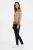 Next-brazowy-sweter-w-biale-pasy-modelka-przod2.webp