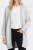 Primark-szara-narzuta-modelka-glowne.webp
