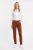Aeropostale-kasztanowe-spodnie-jeansy-chino-modelka-przod.webp