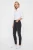 H&M-czarne-spodnie-jeansowe-z-dziurami-modelka-przod2.webp