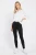 George-czarne-spodnie-jeans-jegginsy-modelka-przod.webp