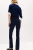 M&S-The-Eva-Bootcut-granatowe-spodnie-jeansy-modelka-tyl.webp
